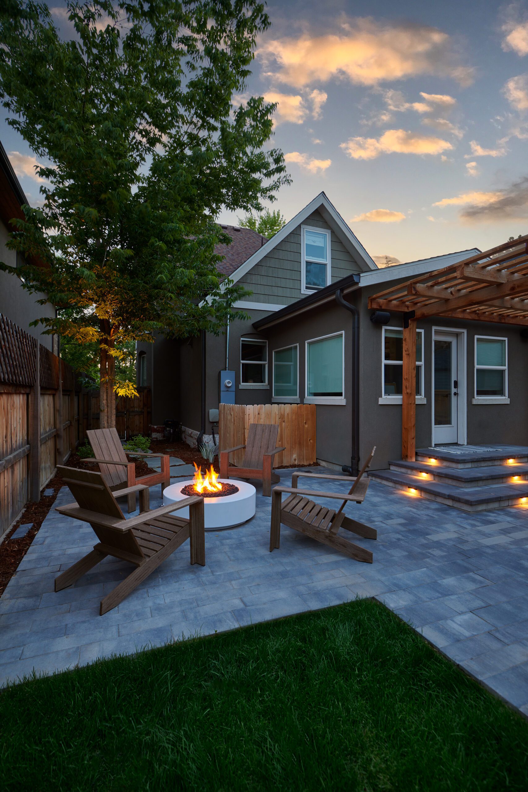 Beautiful paver patio with pergola and fire pit in Lone Tree, CO
