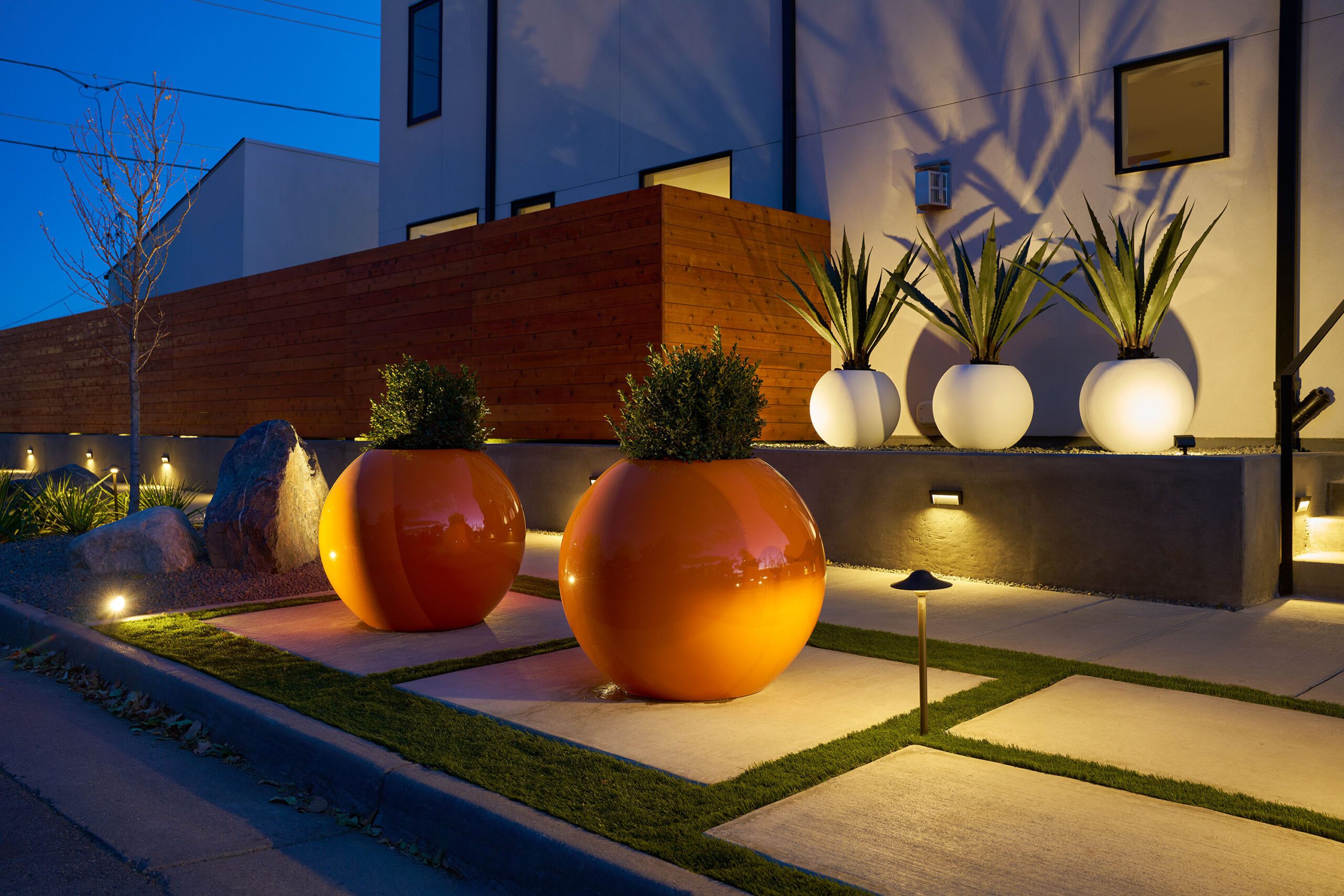 Landscape design with plantings and outdoor lighting in Greenwood Village, CO