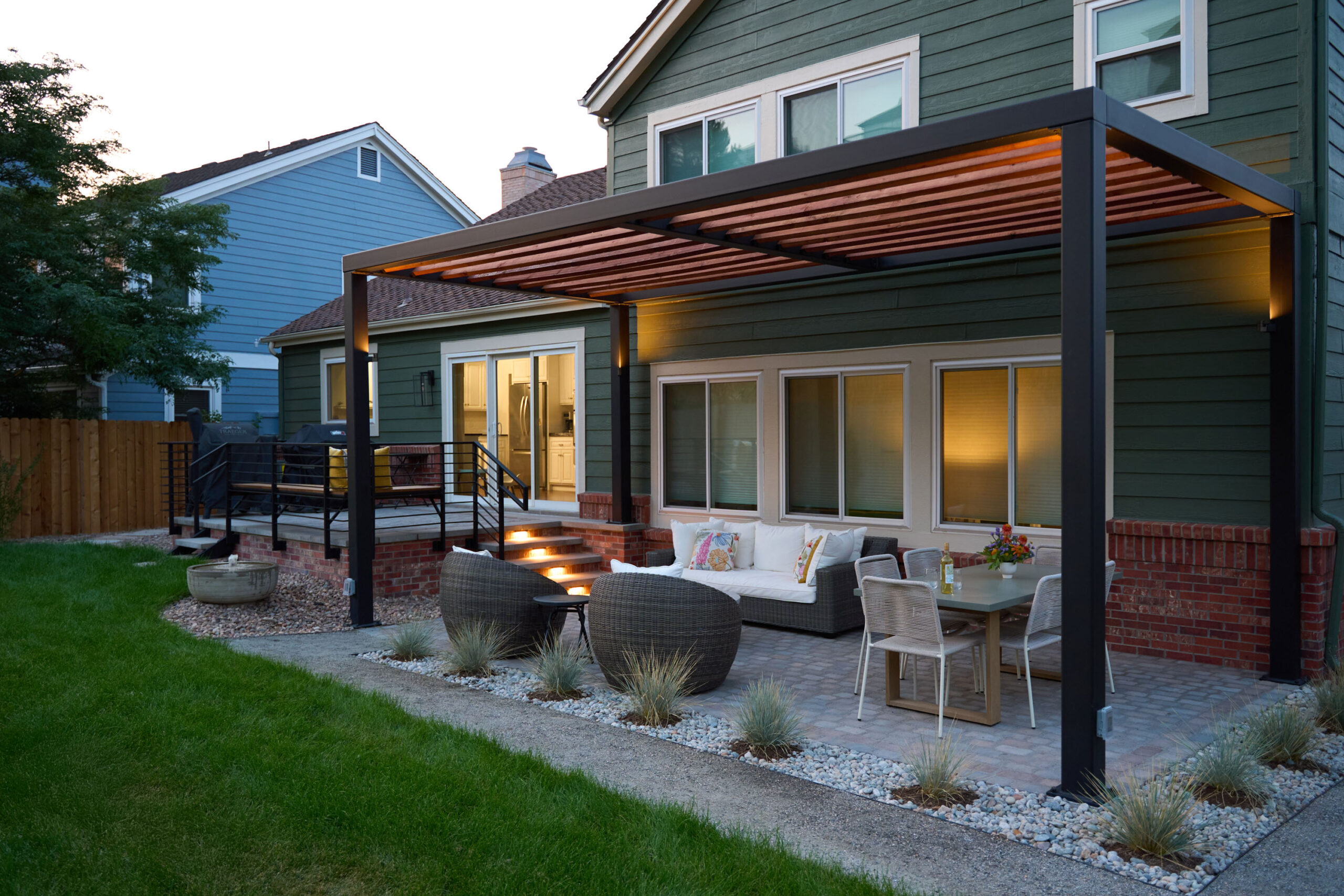 Pergola and outdoor fireplace with expert masonry work in Highlands Ranch, CO